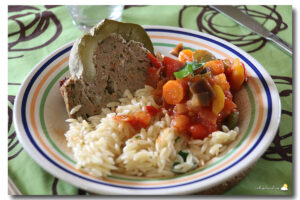 Courgette ronde farcie, ratatouille & pâtes grecques