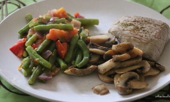 Sauté de veau, haricots tomatés, champignons