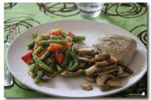 Sauté de veau, haricots tomatés, champignons